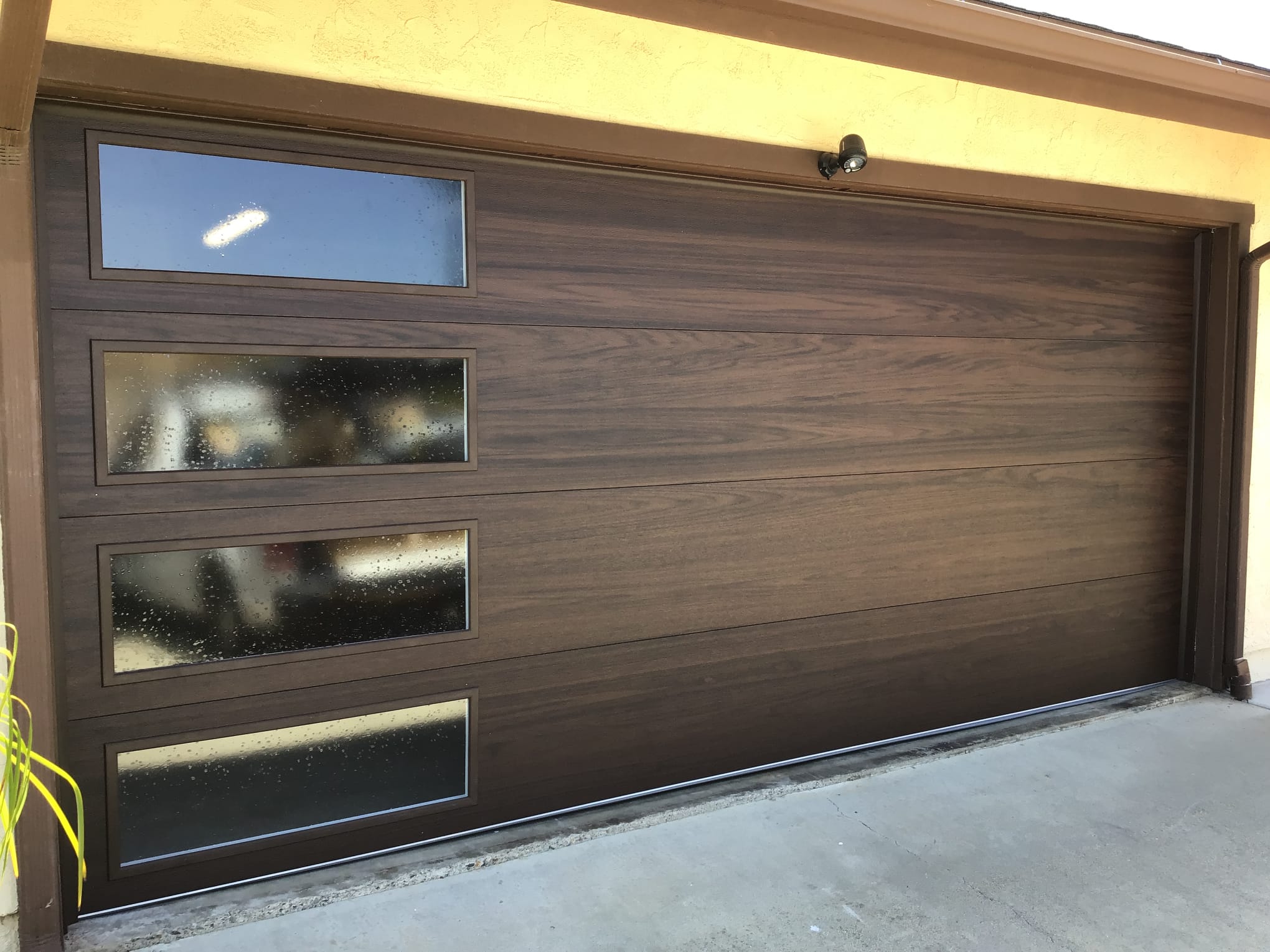 Wood Look Garage Door with Stacked Clear Windows 